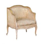 A French giltwood and upholstered bergere armchair