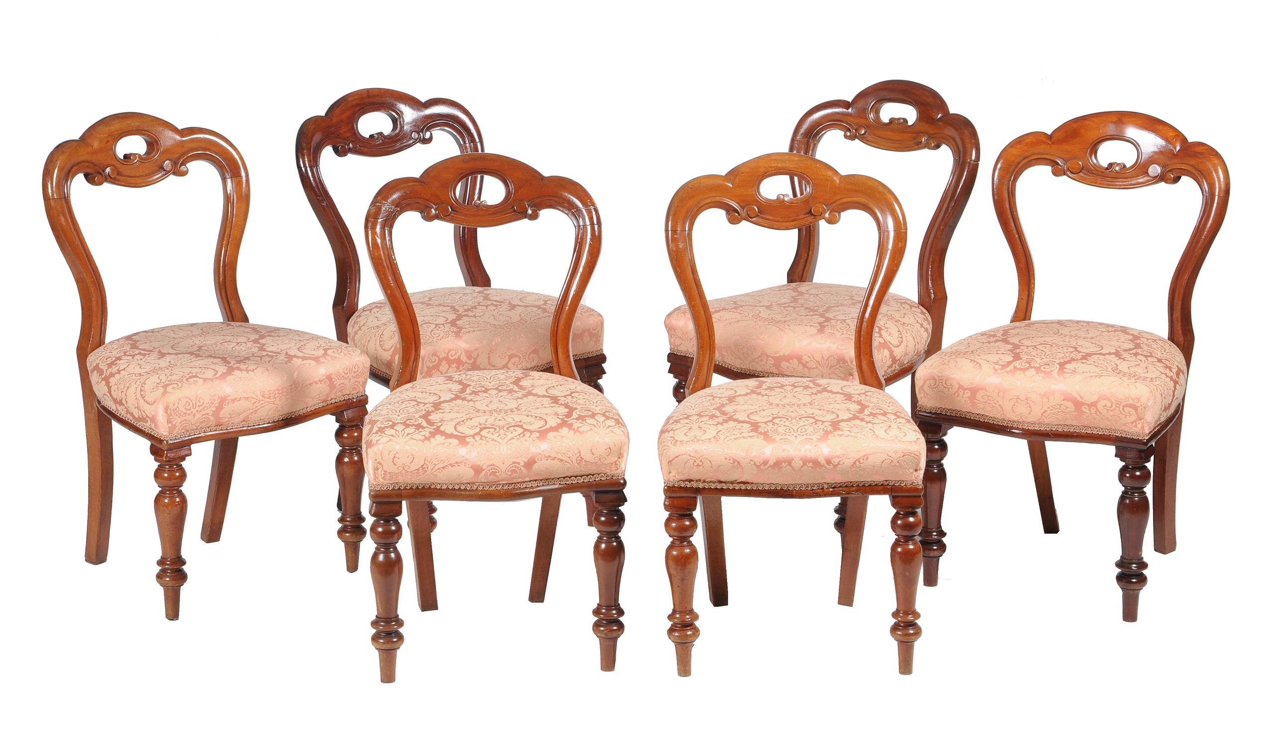 A set of twelve Victorian mahogany dining chairs