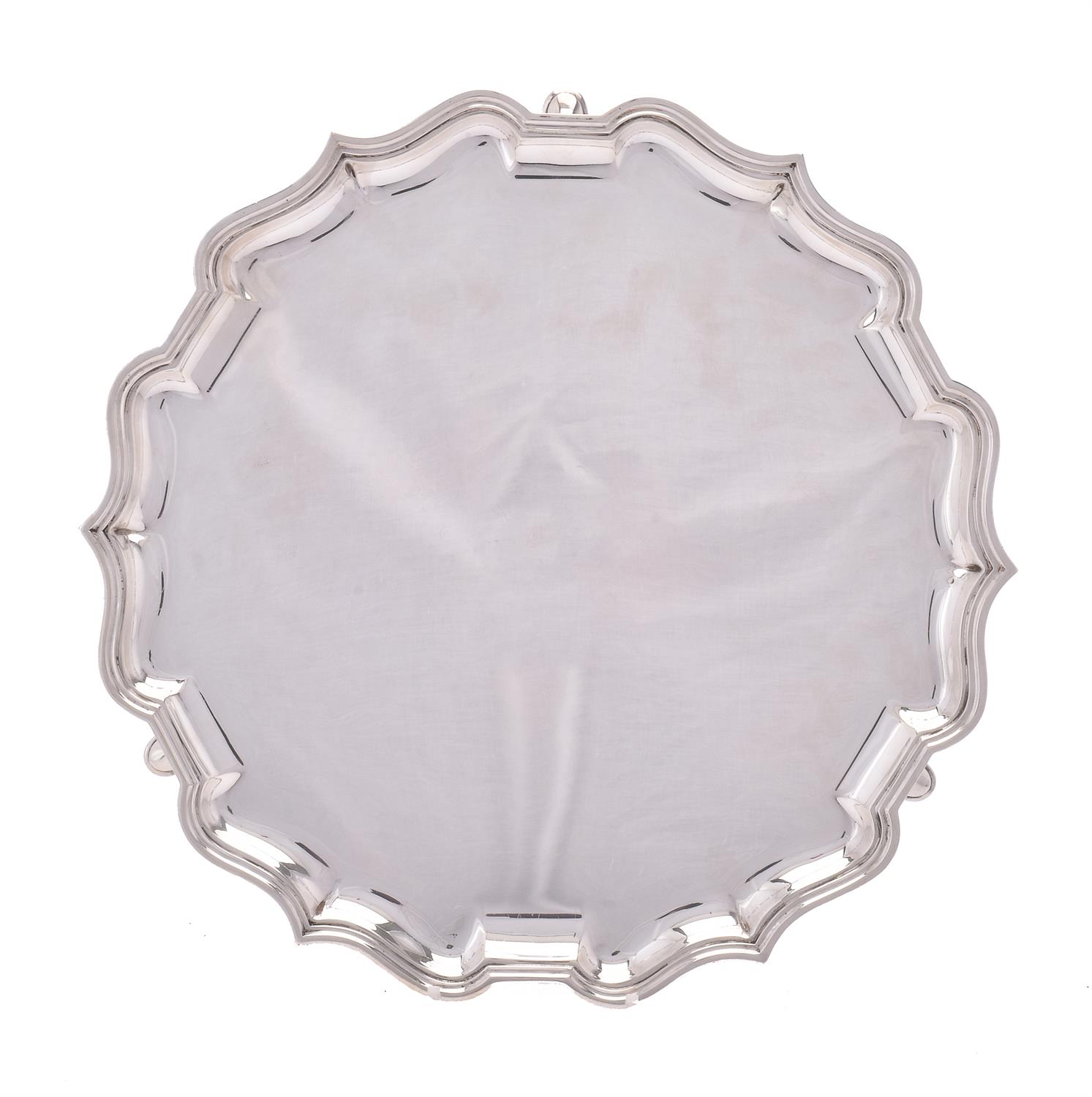 A silver shaped circular salver by Elkington & Co.