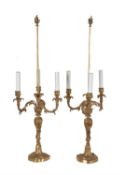 A pair of French gilt bronze Rococo Revival three-branch candelabra