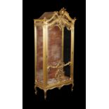 A French carved giltwood vitrine