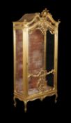 A French carved giltwood vitrine