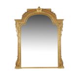 A mid-Victorian carved giltwood and composition large overmantel mirror