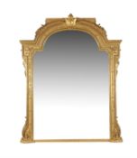 A mid-Victorian carved giltwood and composition large overmantel mirror
