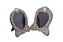 Two silver heart shaped photograph frames