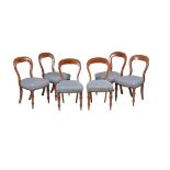 A set of twelve Victorian mahogany dining chairs