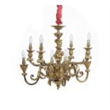 A French gilt metal eight light chandelier in Louis XVI style