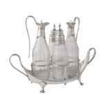 A George III silver twin handled navette shape cruet stand