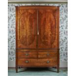 A Regency mahogany and inlaid linen press