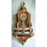 Y An impressive Regence style gilt brass mounted tortoiseshell bracket clock