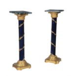 A pair of Empire style marble gilt metal and blue lacquered pedestals