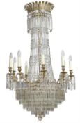 A gilt metal and cut glass nine light chandelier in Regency style