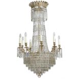 A gilt metal and cut glass nine light chandelier in Regency style