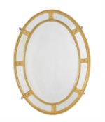 A carved giltwood oval marginal wall mirror