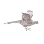 A silver model of an alarmed pheasant