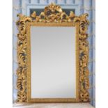 A substantial giltwood Florentine overmantel mirror