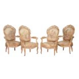 A set of four rubbed gilt fauteuils in Louis XV style