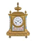 A French Sevres style porcelain and gilt metal mounted mantel clock