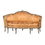 A Louis XV carved giltwood and painted sofa