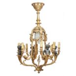 A Rococo Revival gilt and patinated bronze four branch chandelier