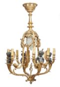 A Rococo Revival gilt and patinated bronze four branch chandelier