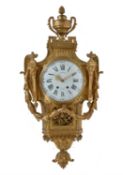 A Louis XVI style gilt brass cartel clock