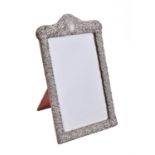 An Edwardian silver mounted dressing table mirror by Henry Matthews