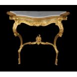 A carved giltwood console table in 18th century style