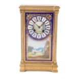 A French Sevres style porcelain and gilt metal library clock