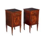 A pair of Edwardian mahogany bedside cupboards