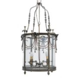 A gilt metal and glazed cylindrical hall lantern in Louis XVI style