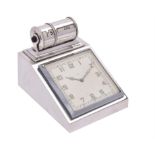 A silver cased desk timepiece and perpetual calendar by Padgett & Braham Ltd