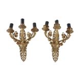 A pair of Charles X gilt bronze three light wall appliques