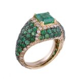 An emerald and diamond ring