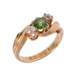 An Edwardian 18 carat gold demantoid garnet and diamond ring