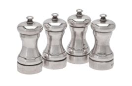 Four silver pepper mills by M. C. Hersey & Son Ltd.