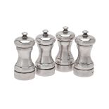 Four silver pepper mills by M. C. Hersey & Son Ltd.