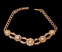 An Edwardian half pearl bracelet