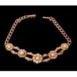 An Edwardian half pearl bracelet