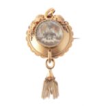 Y An early Victorian gold and sepia wash brooch