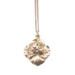 An Art Nouveau style ruby and diamond locket