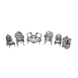 A collection of silver miniature furniture