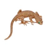 A yellow sapphire and emerald salamander brooch