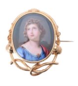 A mid 19th century painted porcelain brooch