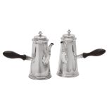 A pair of late Victorian silver tapering coffee pots by Charles Stuart Harris