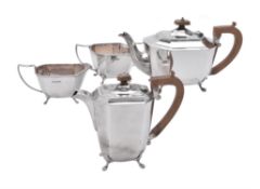 An Edwardian silver octagonal shaped four piece tea set by Harrison Fisher & Co.