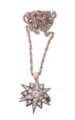 A Victorian diamond star brooch/pendant on chain