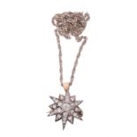 A Victorian diamond star brooch/pendant on chain