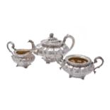 Y A George and William IV matched silver circular lobed three piece tea set by William Bateman II