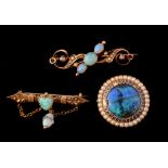 A late Victorian gold and opal brooch